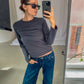 Celine är 168 cm lång och bär storlek XS. | mörkgrå