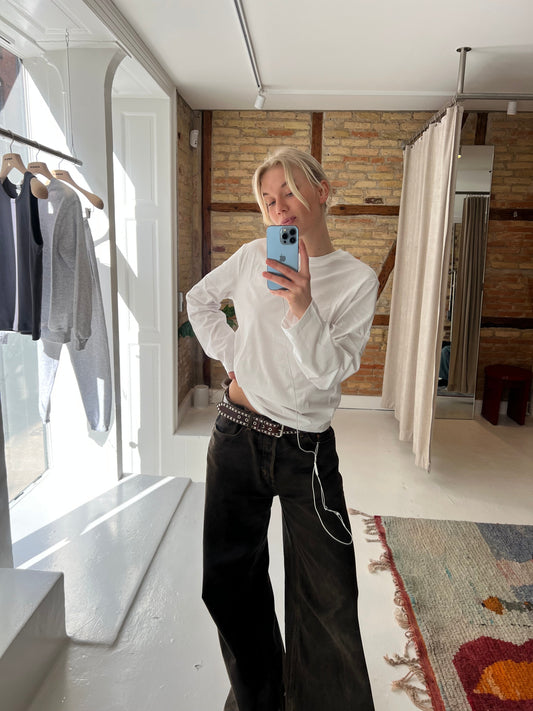 Sofie är 172 cm lång och bär storlek M. 