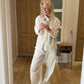 Sofie är 170 cm lång och bär storlek M.