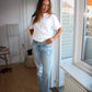 Nadia är 170 cm lång och bär storlek S. | vit